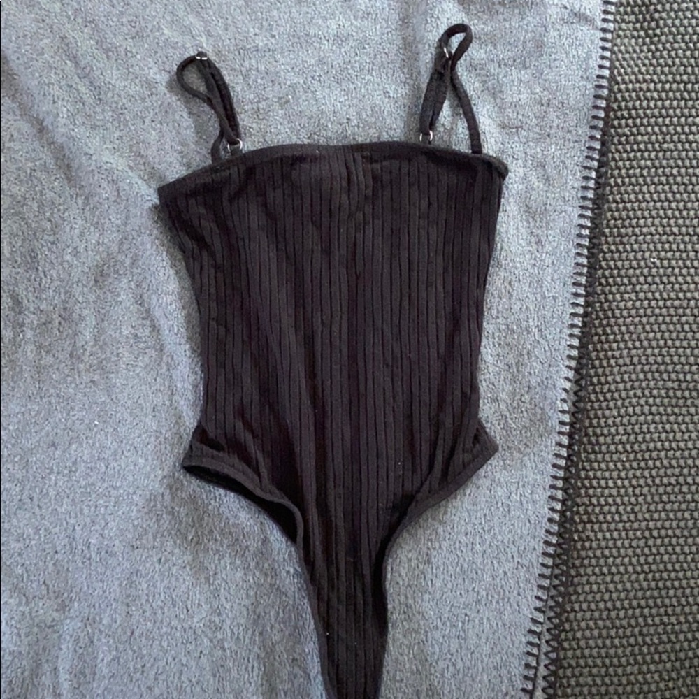 Straight across black body suit